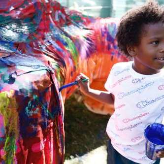 child painting color statue child painting color statue