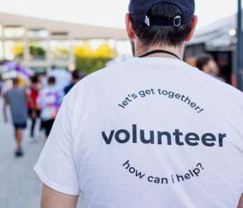 man wearing volunteer shirt