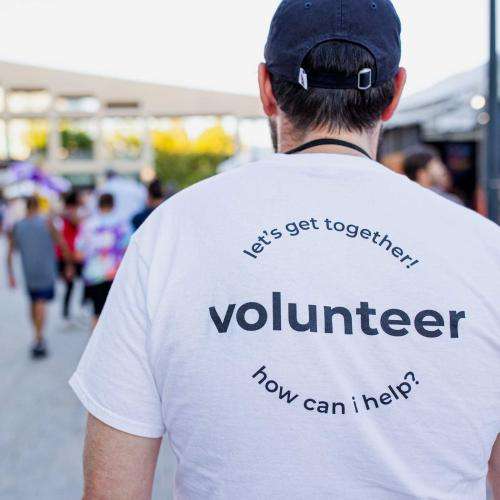 man wearing volunteer shirt